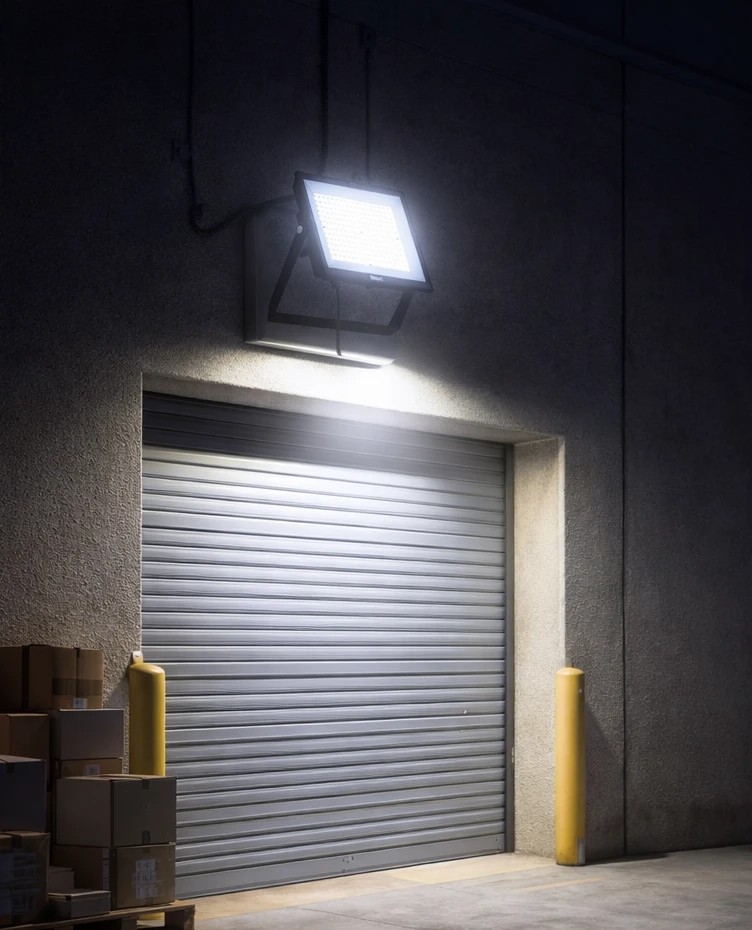 Philips SmartBright G5 LED floodlight, 200W, 6500K, 20000lm, mounted above a roller shutter door. UAE