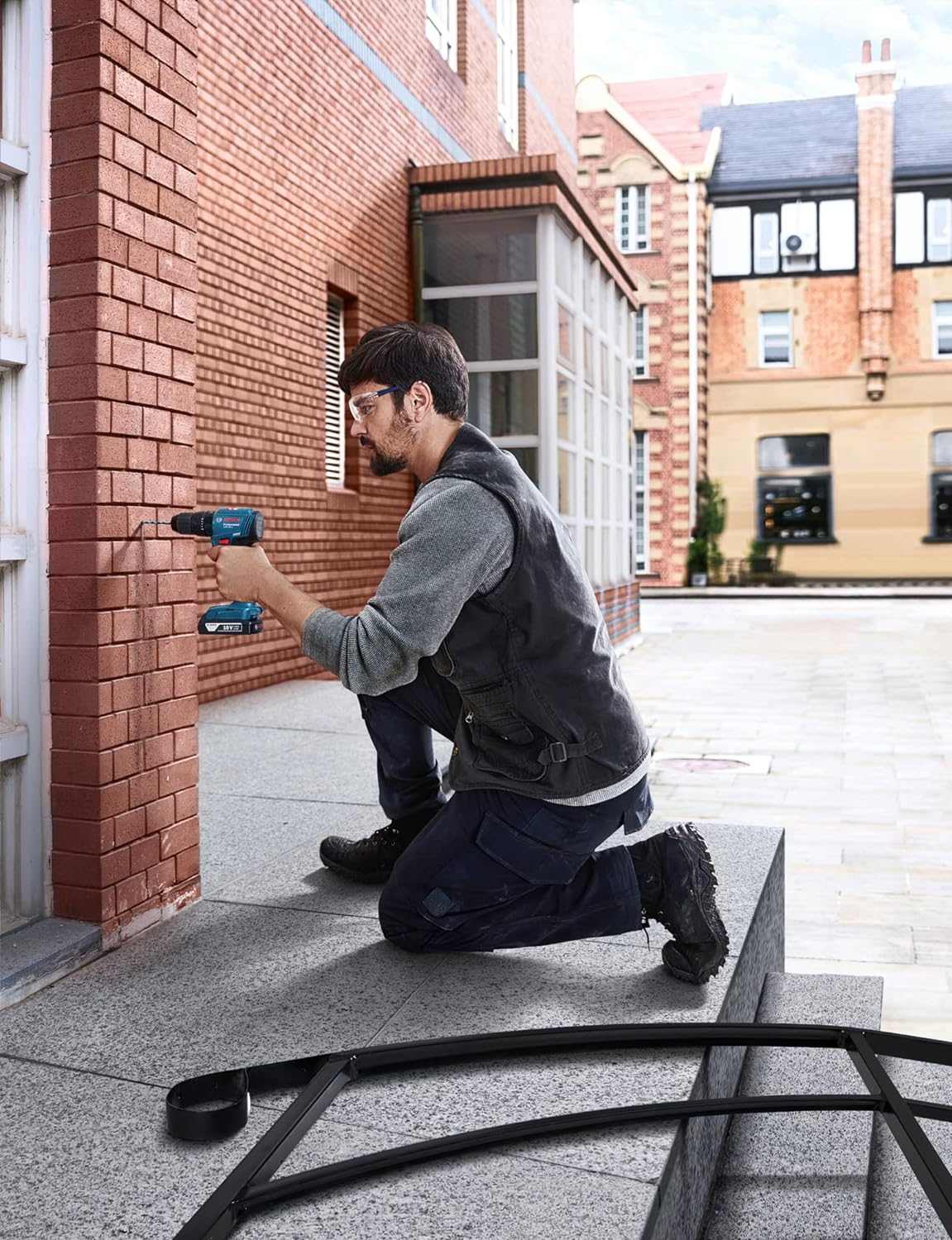 Bosch Professional GSB 185-LI 18V Impact Drill (2x2.0 Ah, GAL 18V-20, 23 pcs Accessories) - Deluxe Electricals