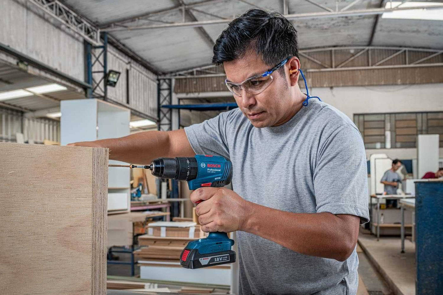 Bosch Professional GSB 185-LI 18V Impact Drill (2x2.0 Ah, GAL 18V-20, 23 pcs Accessories) - Deluxe Electricals