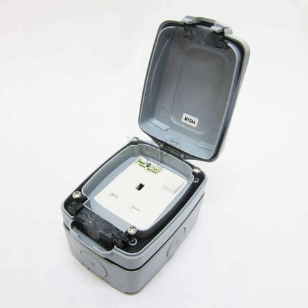 MK Electric 13A outdoor weatherproof switch socket in grey, IP66 Masterseal Compact 86486GRY with hinged lid UAE