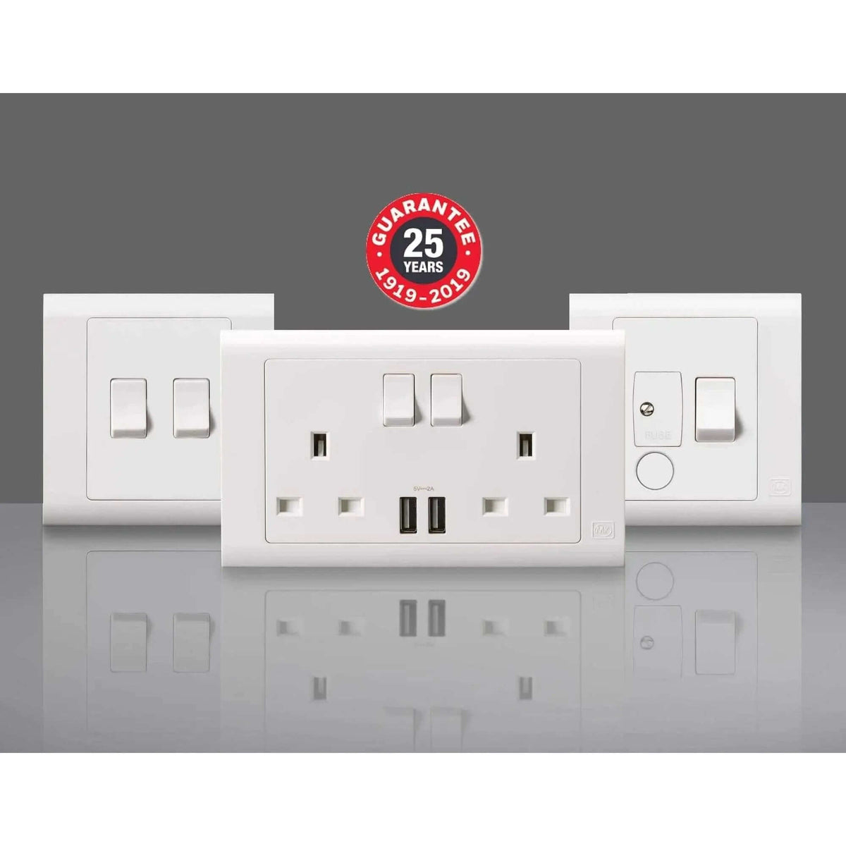 MK Essentials 10AX 1G intermediate switch with wide rocker on white multi-gang faceplate by MK Electric UAE