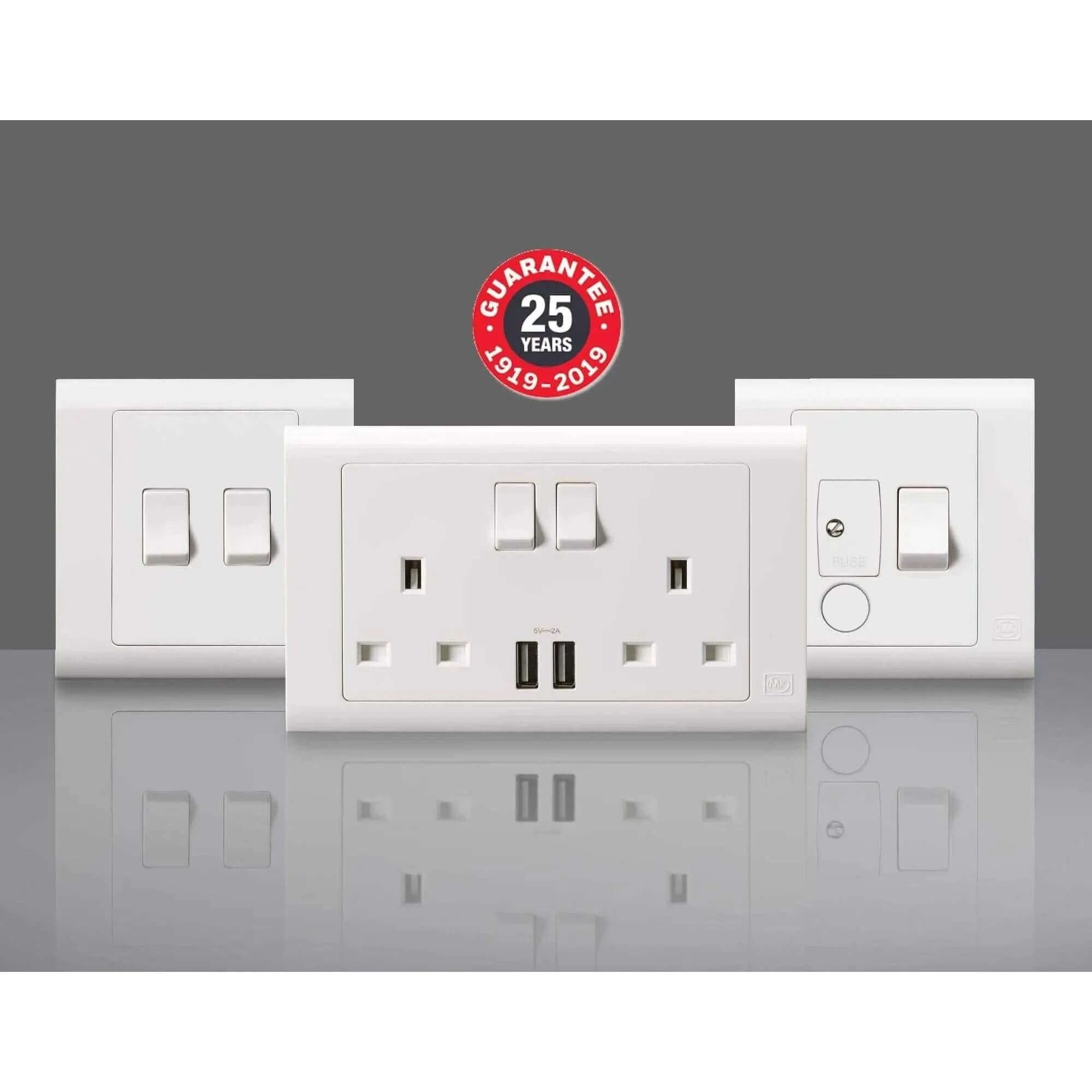 MK Essentials 10AX 1G intermediate switch with wide rocker on white multi-gang faceplate by MK Electric UAE