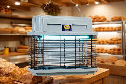 Mo-El Cri Cri 309 UV-A electric bug zapper with blue glow, hanging chain, metal grid in bakery setting UAE